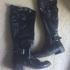 Black leather boots with buckle detail